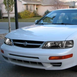 97-99 Nissan Maxima Factory Style Replacement Headlights - Black / Clear -High-Efficiency Car Light Store 97 99 nissan maxima factory style replacement headlights black clear 98