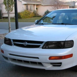 97-99 Nissan Maxima Factory Style Replacement Headlights - Smoked Lens / Clear -High-Efficiency Car Light Store 97 99 nissan maxima factory style replacement headlights smoked lens clear 97